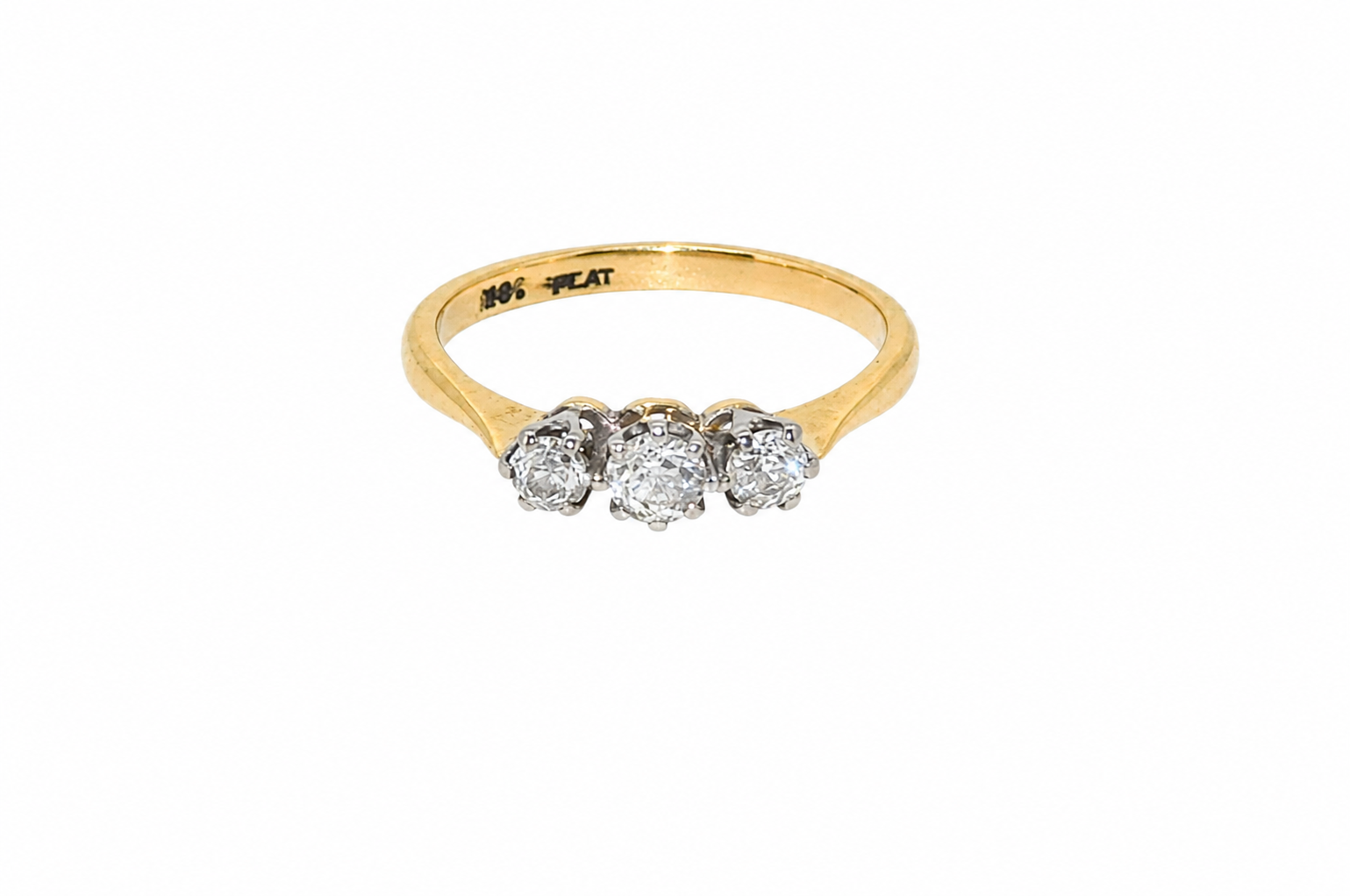 A vintage diamond trilogy ring