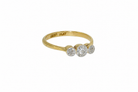 A vintage illusion set diamond three stone