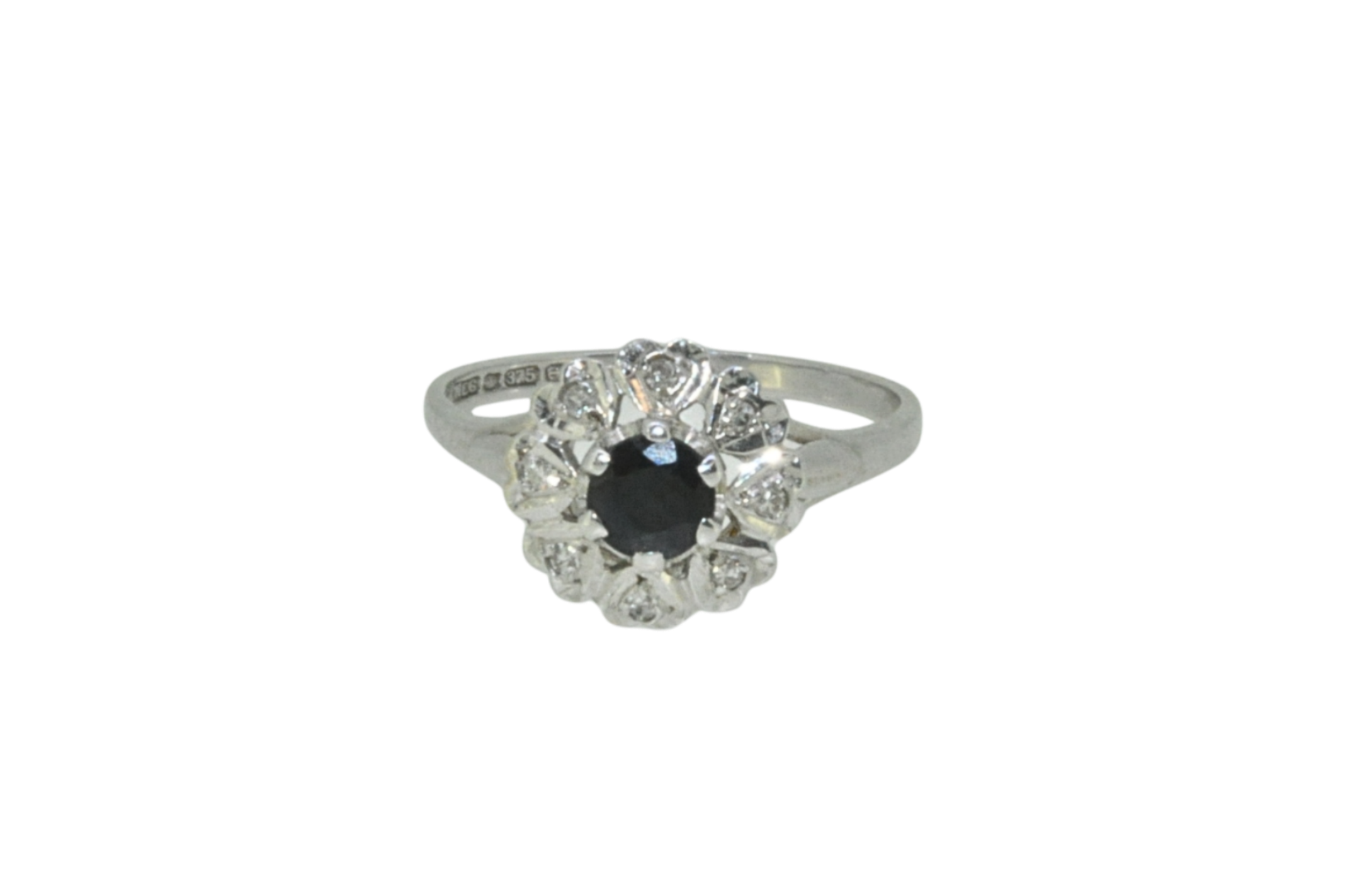A vintage sapphire and diamond cluster ring