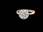 A vintage mid 20th century cluster ring. Principle stone a brilliant cut white diamond, 4mm 