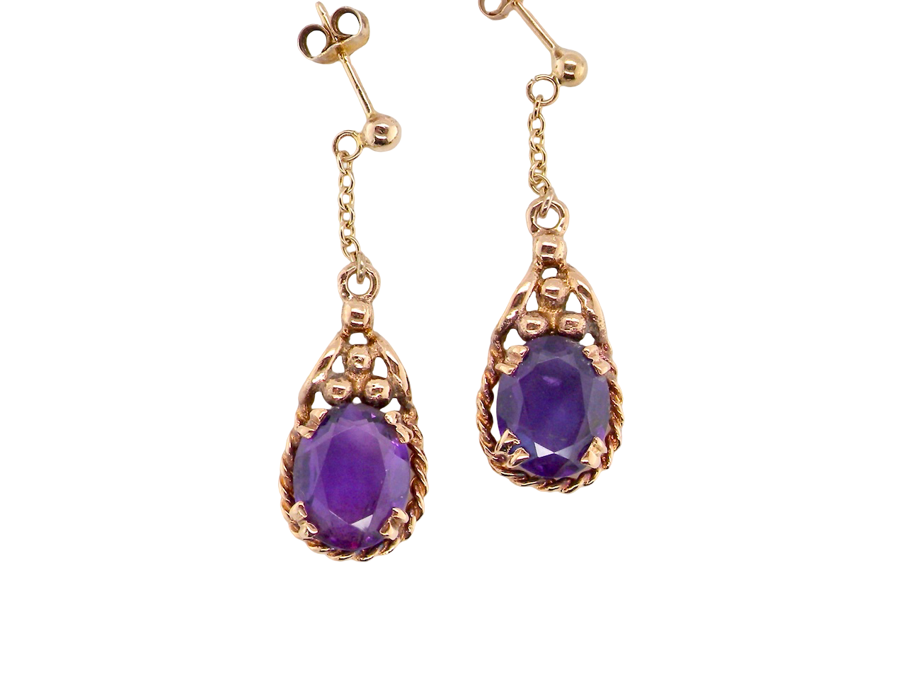 A vintage pair of amethyst drop earrings