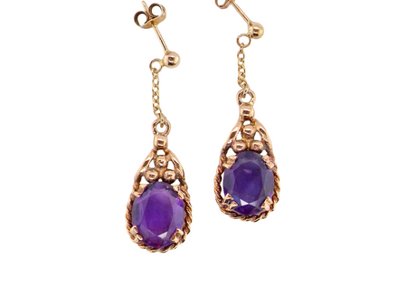 A vintage pair of amethyst drop earrings