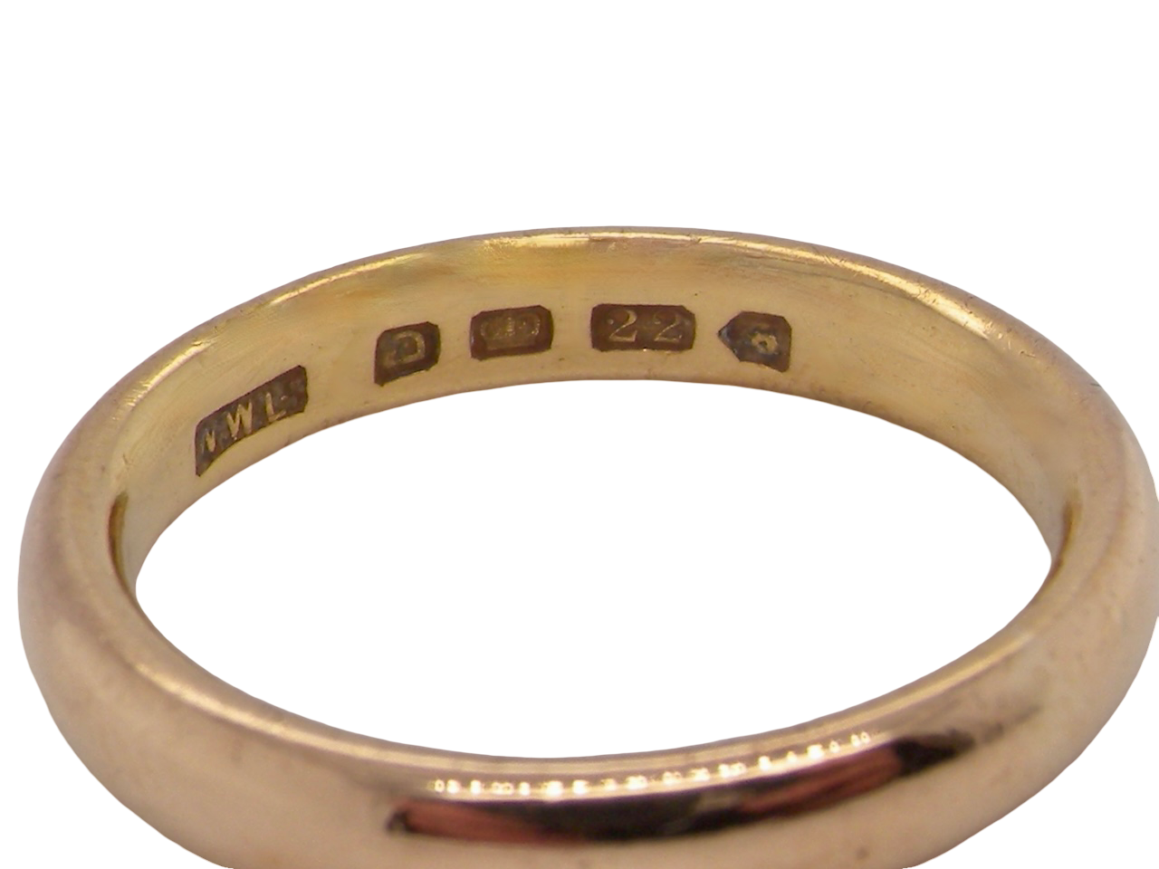 A vintage wedding ring, hallmarked London 1949. 22 carat gold, width 3.5mm.

Weight 6.5 grams.&nbsp; hallmarks