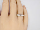 A white gold Diamond Eternity Ring finger view