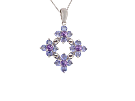 A white gold amethyst and tanzanite pendant