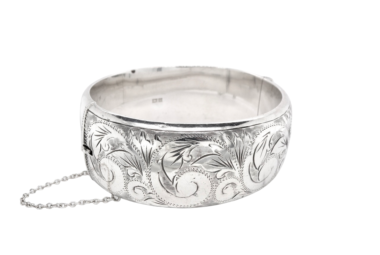 A wide Silver Bangle