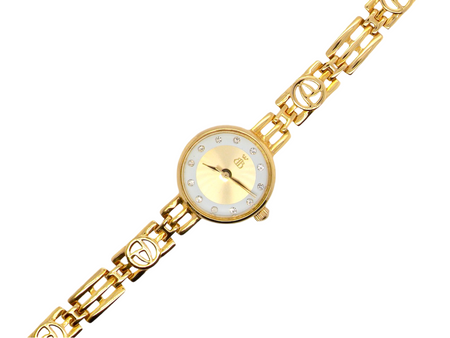 A woman's gold wrist watch