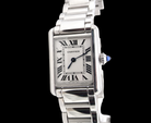 A womans stainless steel Cartier Tank Must wrist watch. Model number WSTA0051.

Silver coloured dial with Roman Numerals. Blue steeled hands. Case measures 29.5x22mm, case thickness 6.6mm. Quartz movement, 
