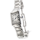 A womans stainless steel Cartier Tank Must wrist watch. Model number WSTA0051.

Silver coloured dial with Roman Numerals. Blue steeled hands. Case measures 29.5x22mm, case thickness 6.6mm. Quartz movement, synthetic sapphire button.
