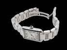 A womans stainless steel Cartier Tank Must wrist watch. Model number WSTA0051.

Silver coloured dial with Roman Numerals. Blue steeled hands. Case measures 29.5x22mm, case thickness 6.6mm. Quartz movement, synthetic sapphire button.
side