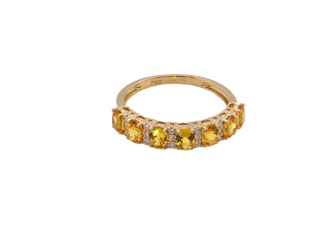 A yellow Sapphire and Diamond eternity ring