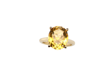 A yellow citrine dress ring