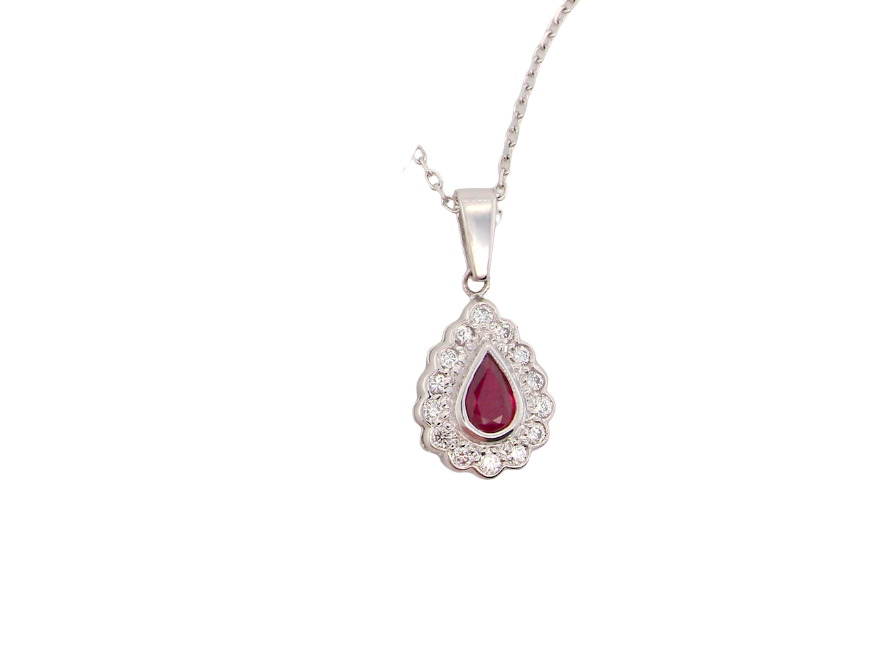 An 18 Carat White Gold Ruby and Diamond Pendant