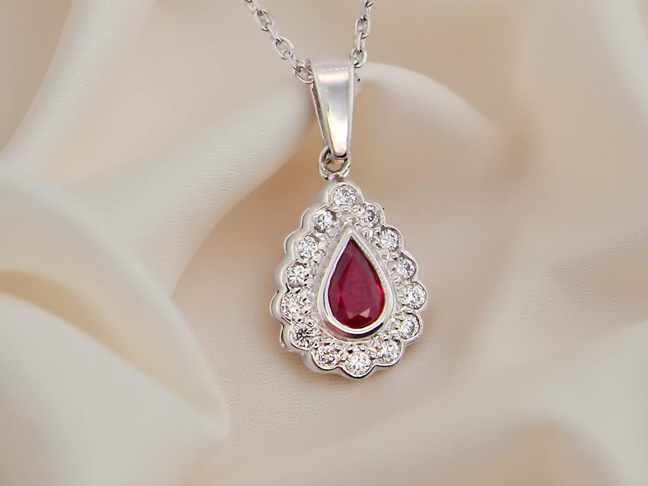 An 18 Carat White Gold Ruby and Diamond Pendant