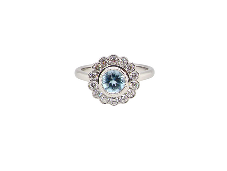An 18 carat White Gold Aquamarine Diamond Cluster Ring