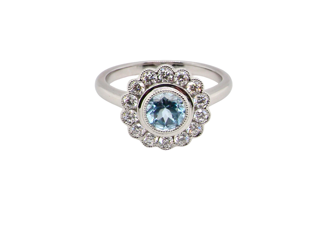 An 18 carat Gold Aquamarine & Diamond Cluster Ring