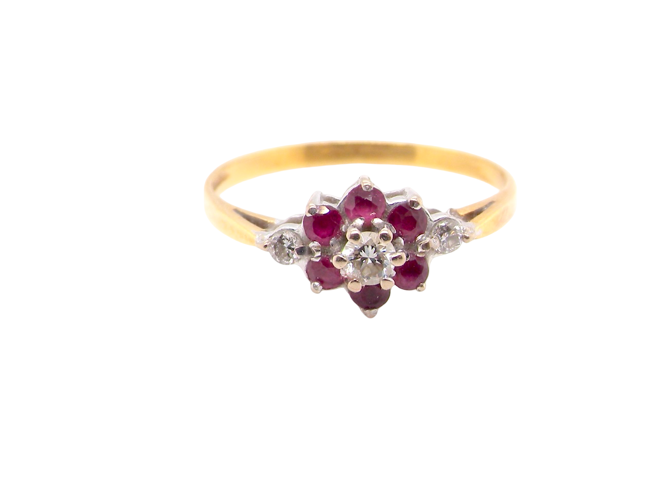 An 18 carat Yellow Gold Diamond and Ruby Cluster Ring