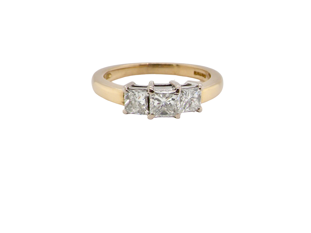 Gold ring with three diamonds on a white background
