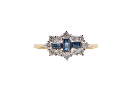 An 18 carat gold Sapphire and Diamond cluster ring