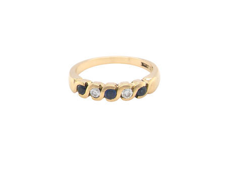 An 18 carat gold Sapphire and Diamond eternity ring