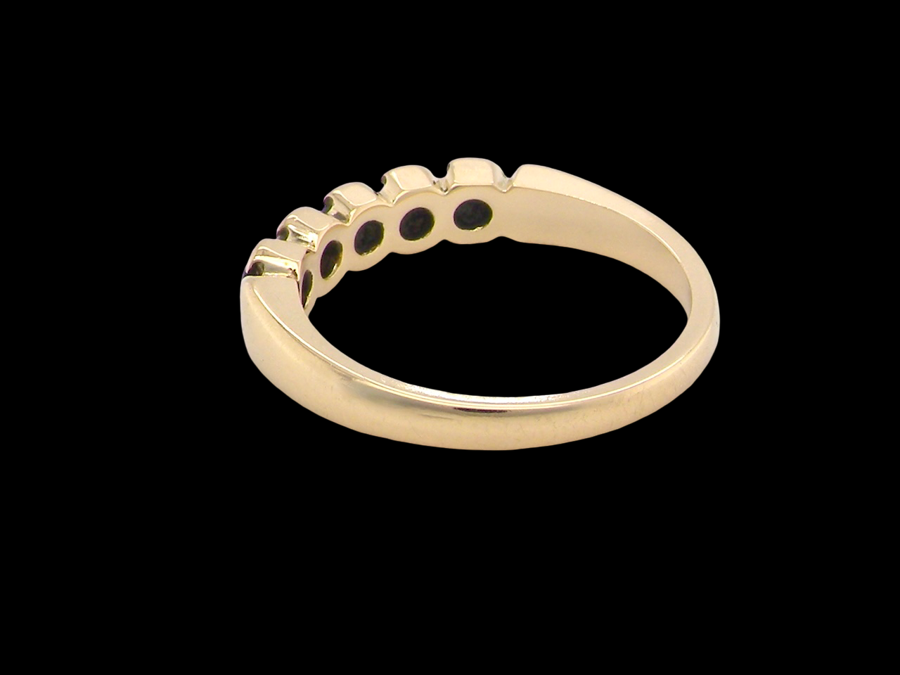 An 18 carat gold Sapphire and Diamond eternity ring