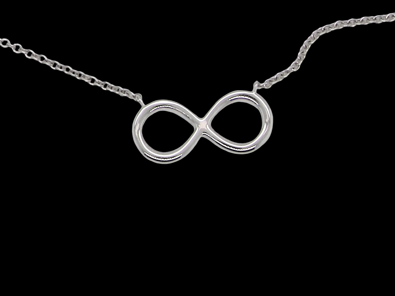An 18 carat white gold Diamond 'Infinity' pendant