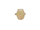 An 18 carat yellow gold* dress ring set with a large  opal gemstone.