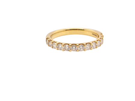 An 18 carat yellow gold half hoop diamond eternity ring originally purchased from Goldsmiths (original boxes supplied)
