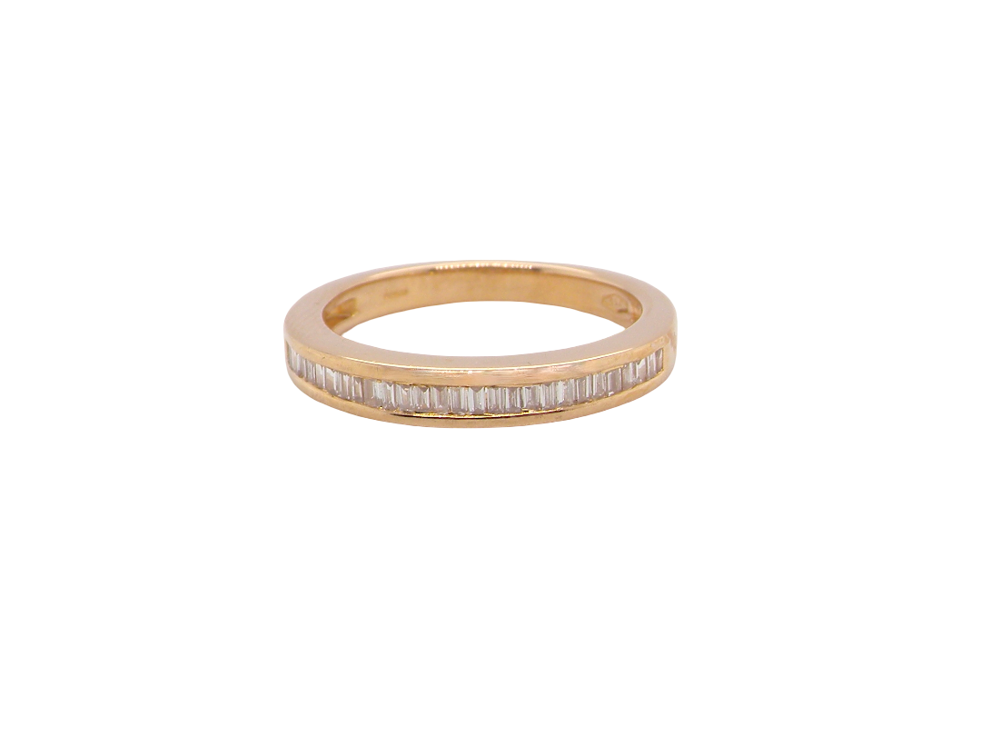 An 18ct gold baguette diamond eternity ring