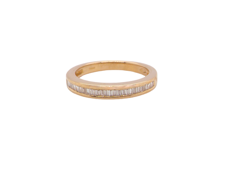 An 18ct gold baguette diamond eternity ring