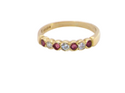 An 18 carat yellow gold half hoop eternity ring. Set with four rubies, 3mm each.&nbsp;

Set with alternate diamonds, each 3mm (0.10 carats each) colour i-j, clarity Si.
