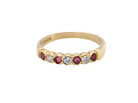Yellow gold ruby and diamond half hoop ring