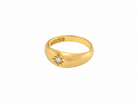 An 18 carat yellow gold ring, sometimes referred to as a 'gypsy' ring. The diamond measures 2.4mm (0.05 carats) star set.