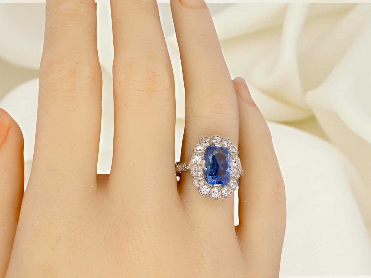 An Art Deco Sapphire and Diamond cluster ring