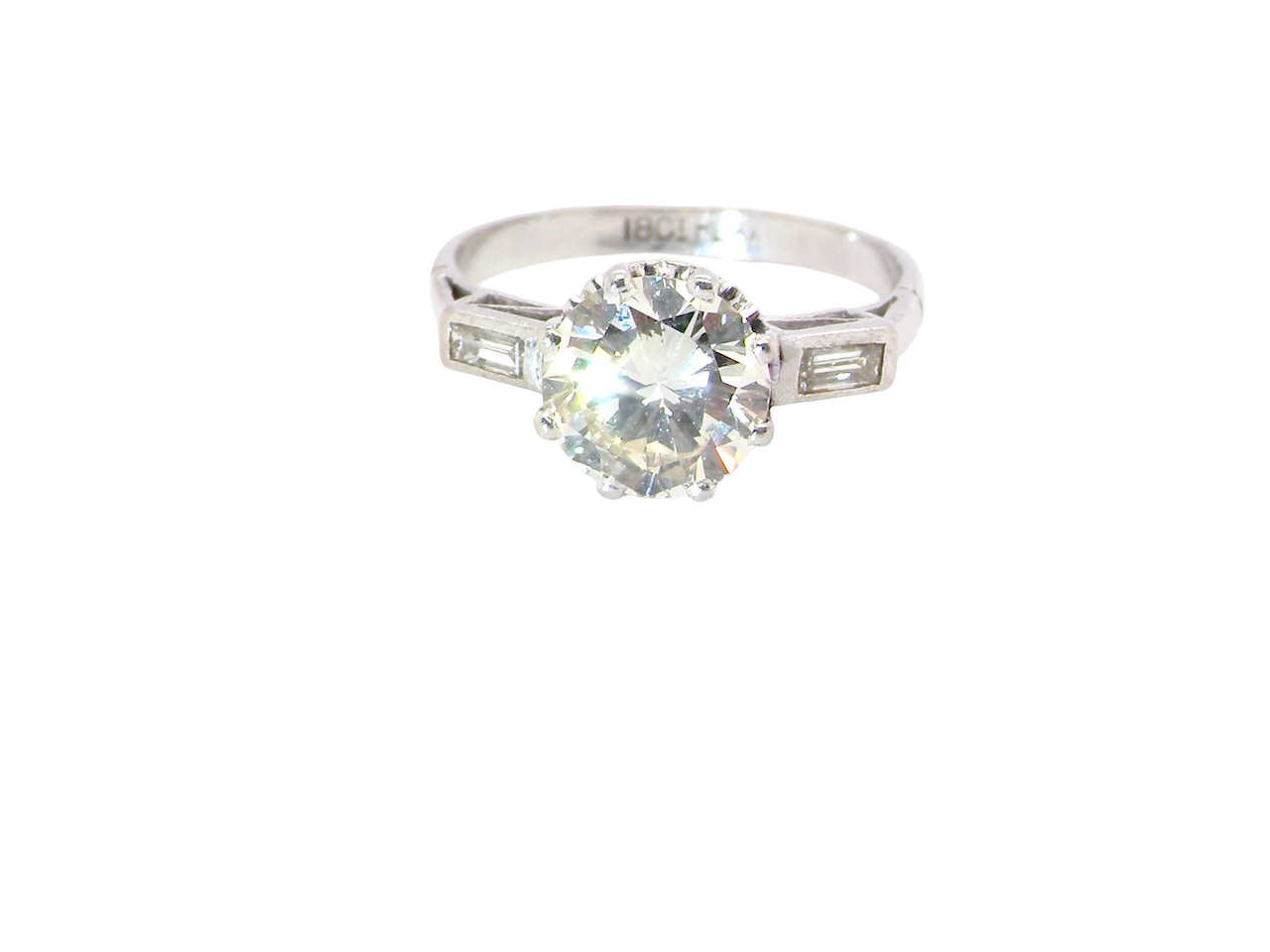 An Art Deco solitaire ring showcasing a beautiful 1.75 carat diamond