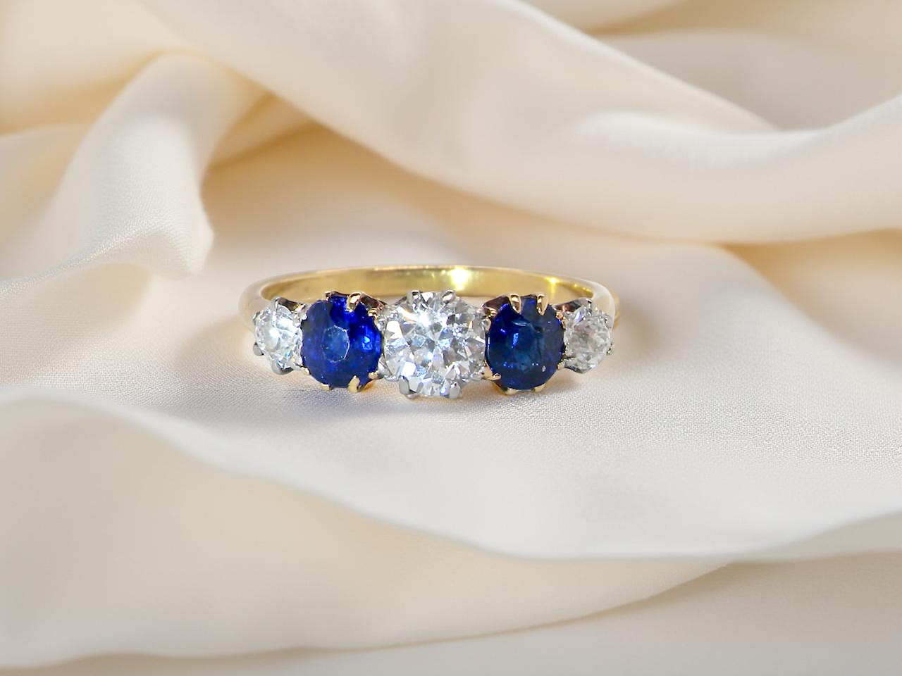 An Early 20th Century 5 Stone Diamond and Sapphire Ring