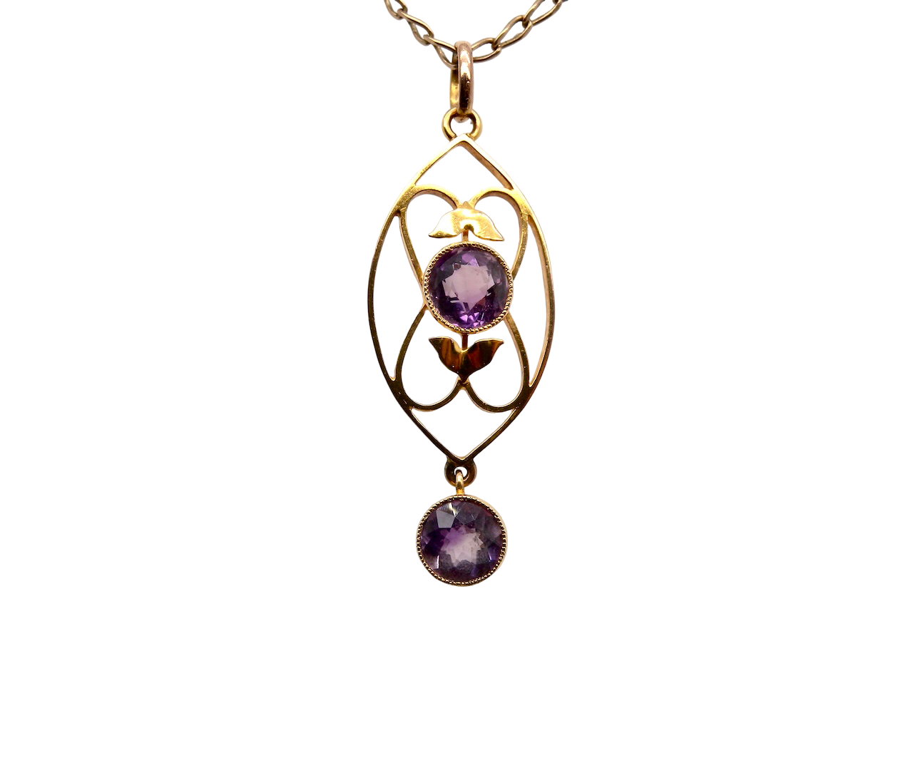 An Edwardian pendant set with two amethyst 