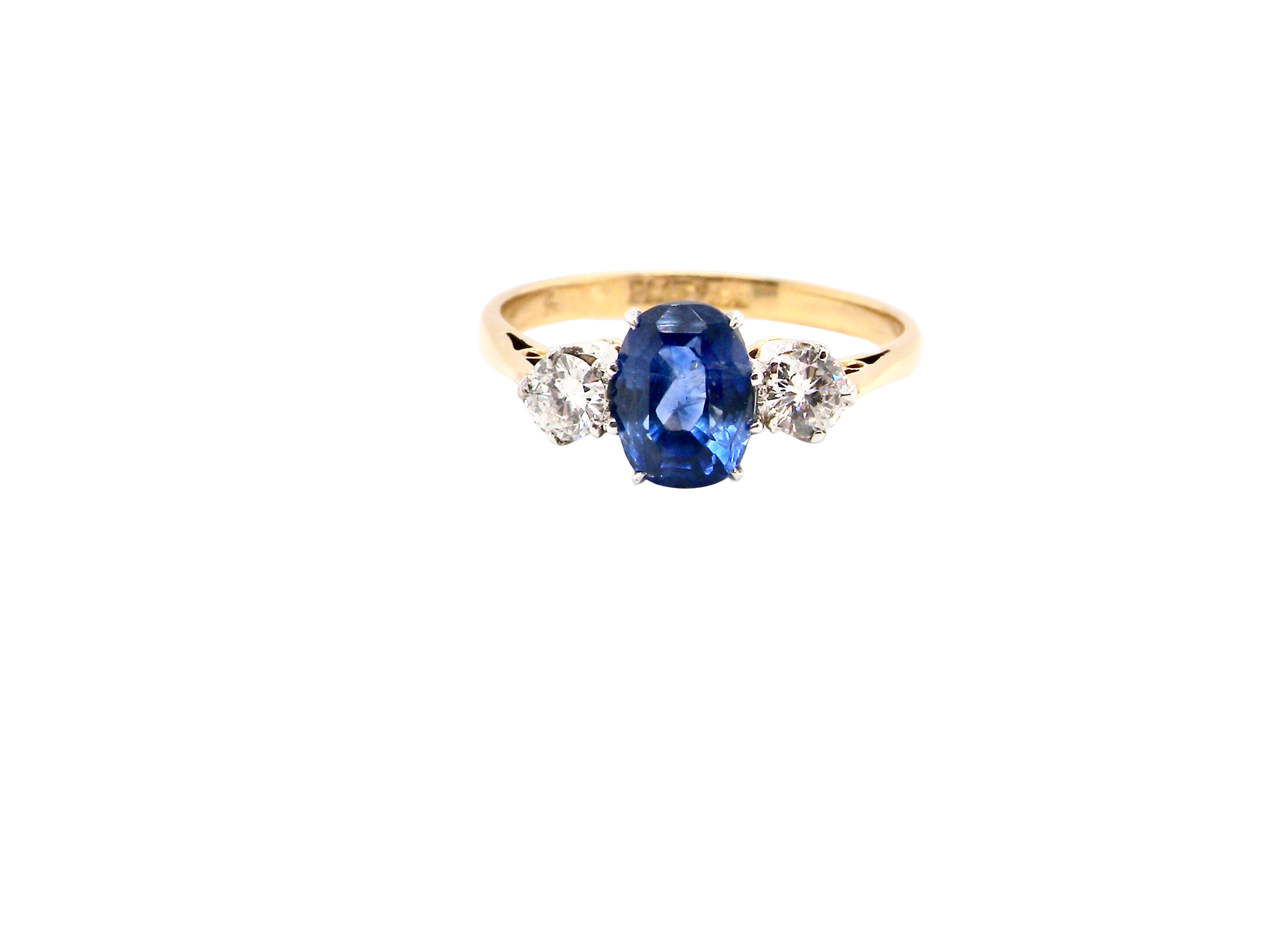 An Elegant three stone Sapphire and Diamond Ring