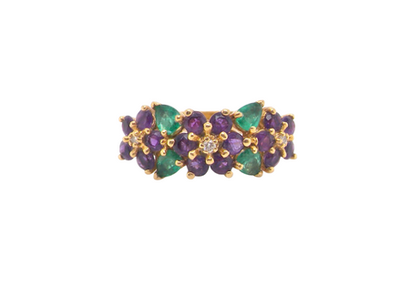 An Emerald Amethyst and Diamond dress ring