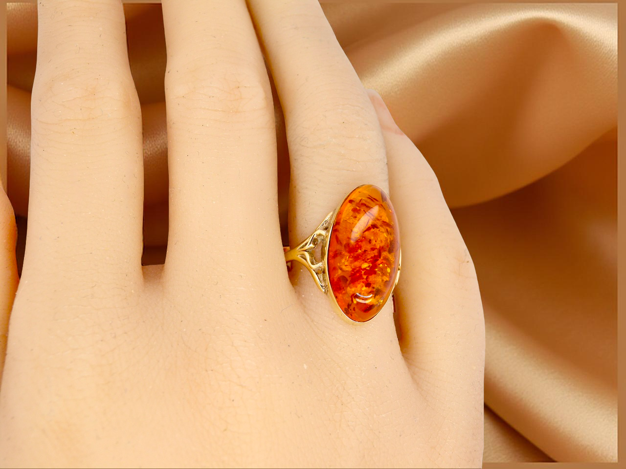 An amber dress ring