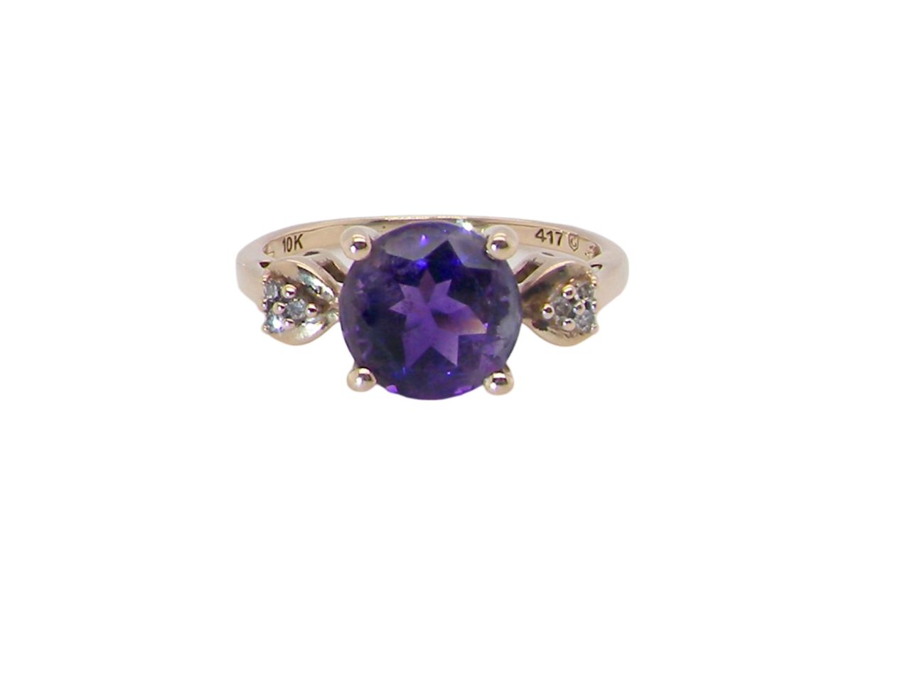 An amethyst and diamond dress ring