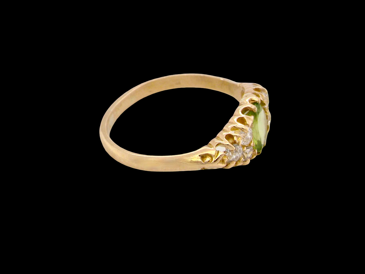 An antique Peridot and Diamond ring