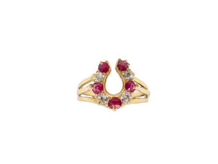 An antique Ruby and Diamond horseshoe shaped ring