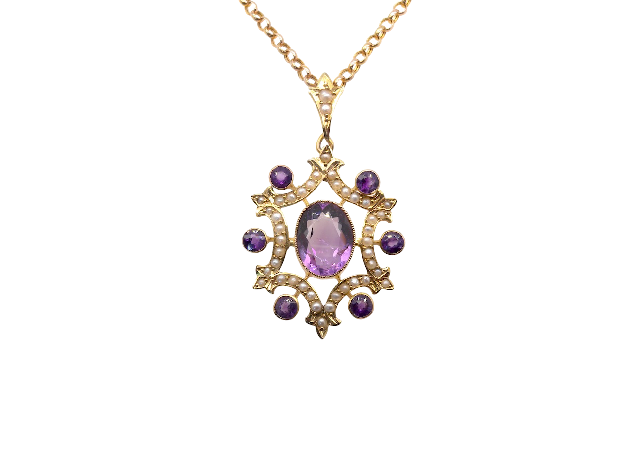 An antique amethyst and pearl pendant