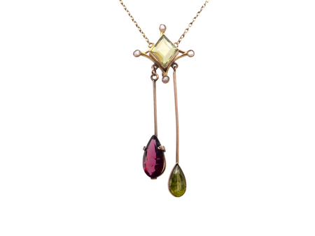 An antique garnet and peridot pendant