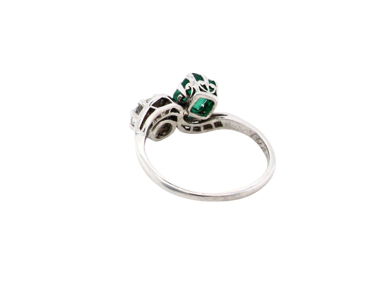 An antique two stone Emerald and Diamond ring