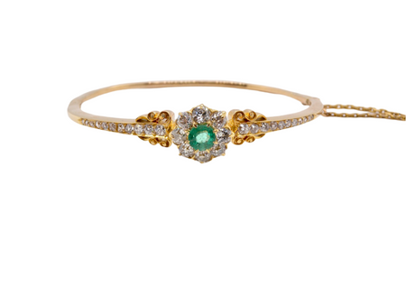 An early 20th century Emerald and Diamond bangle