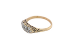 An eight stone boat shaped diamond ring, with two extra 'accent' diamonds to each end side