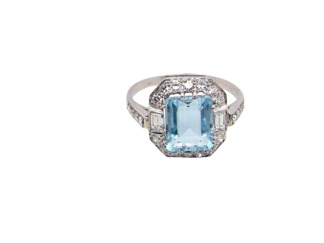 An elegant French Art Deco cluster ring in platinum (tests as), dating to circa 1930–1940 and bearing French  marks.