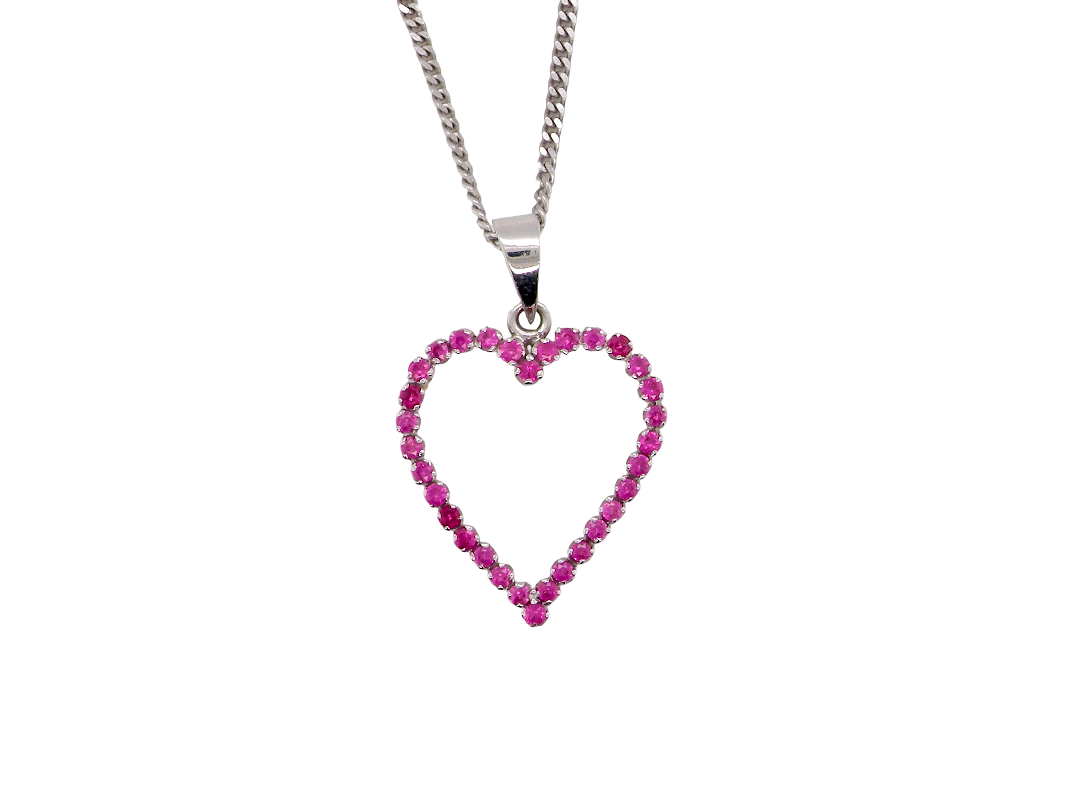 An elegant and beautifully crafted open heart pendant, set with a delightful arrangement of delicate pink sapphires, creating a charming and feminine design.